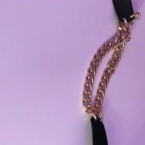 Black belt with gold chain in the middle